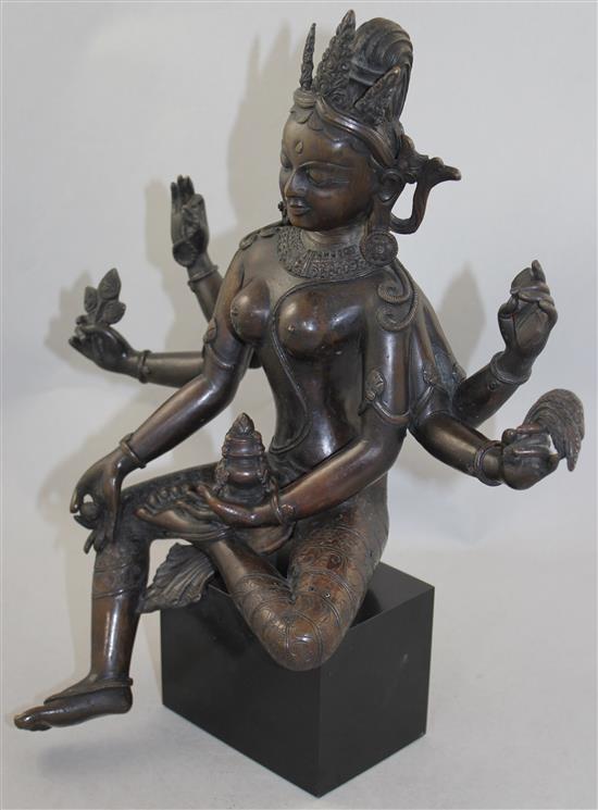 A large Nepalese bronze figure of Vasudhara, 19th century, 34.5cm